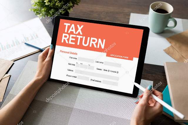 Online tax return application on screen. Business and finance concept.